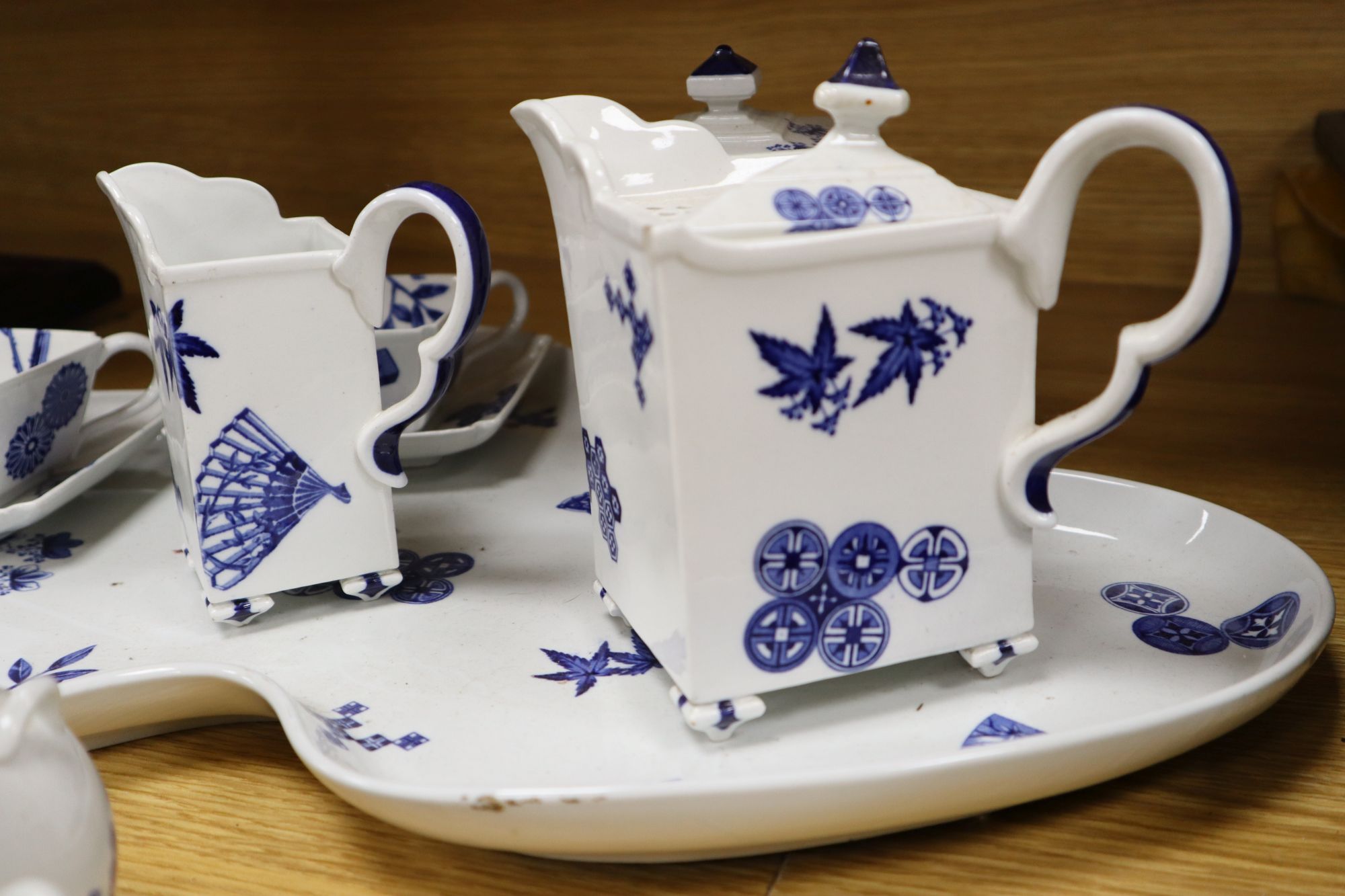 A Royal Worcester Aesthetic period cabaret set and a similar multi-globe vase